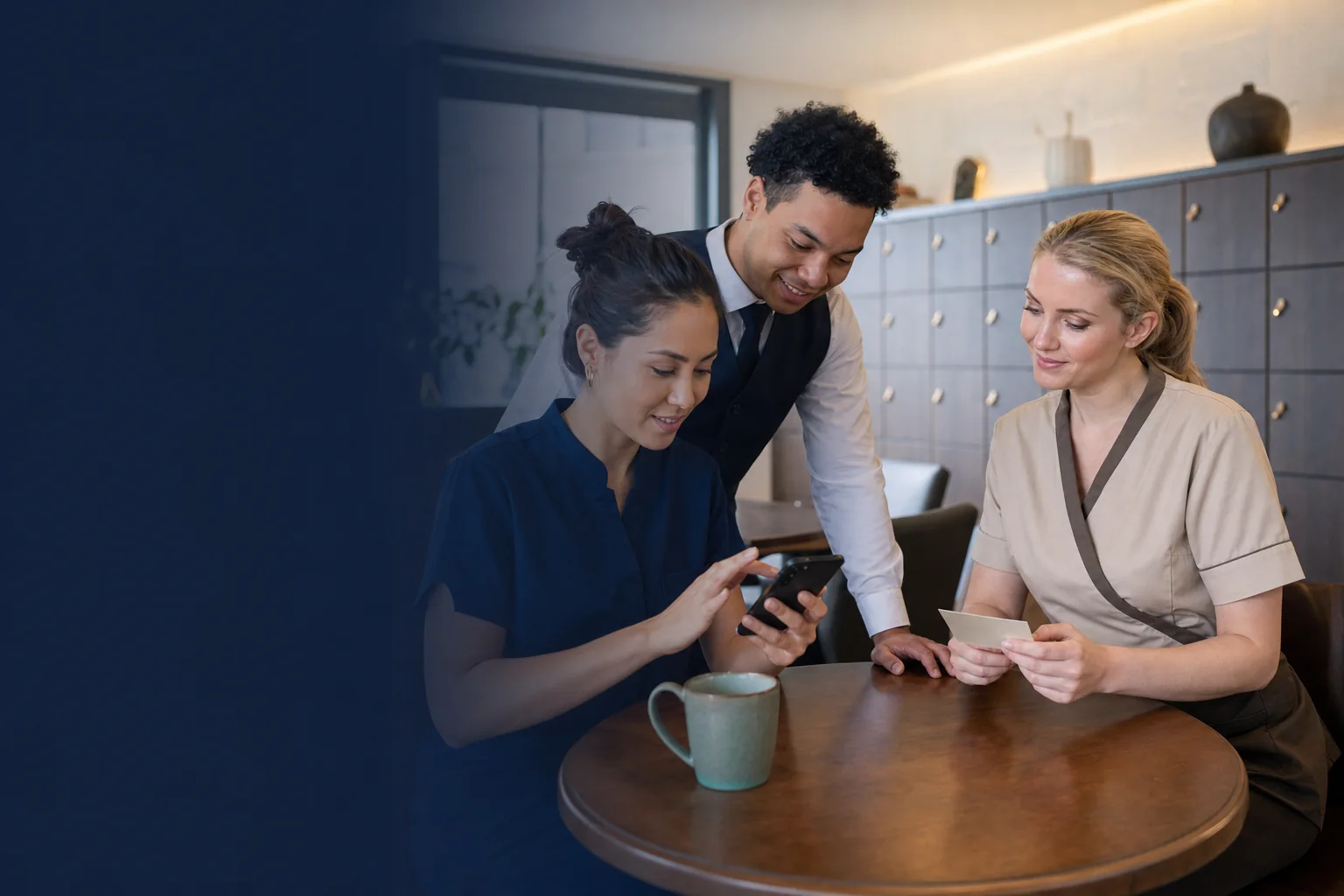 Hotel employees reviewing a voluntary workplace giving option